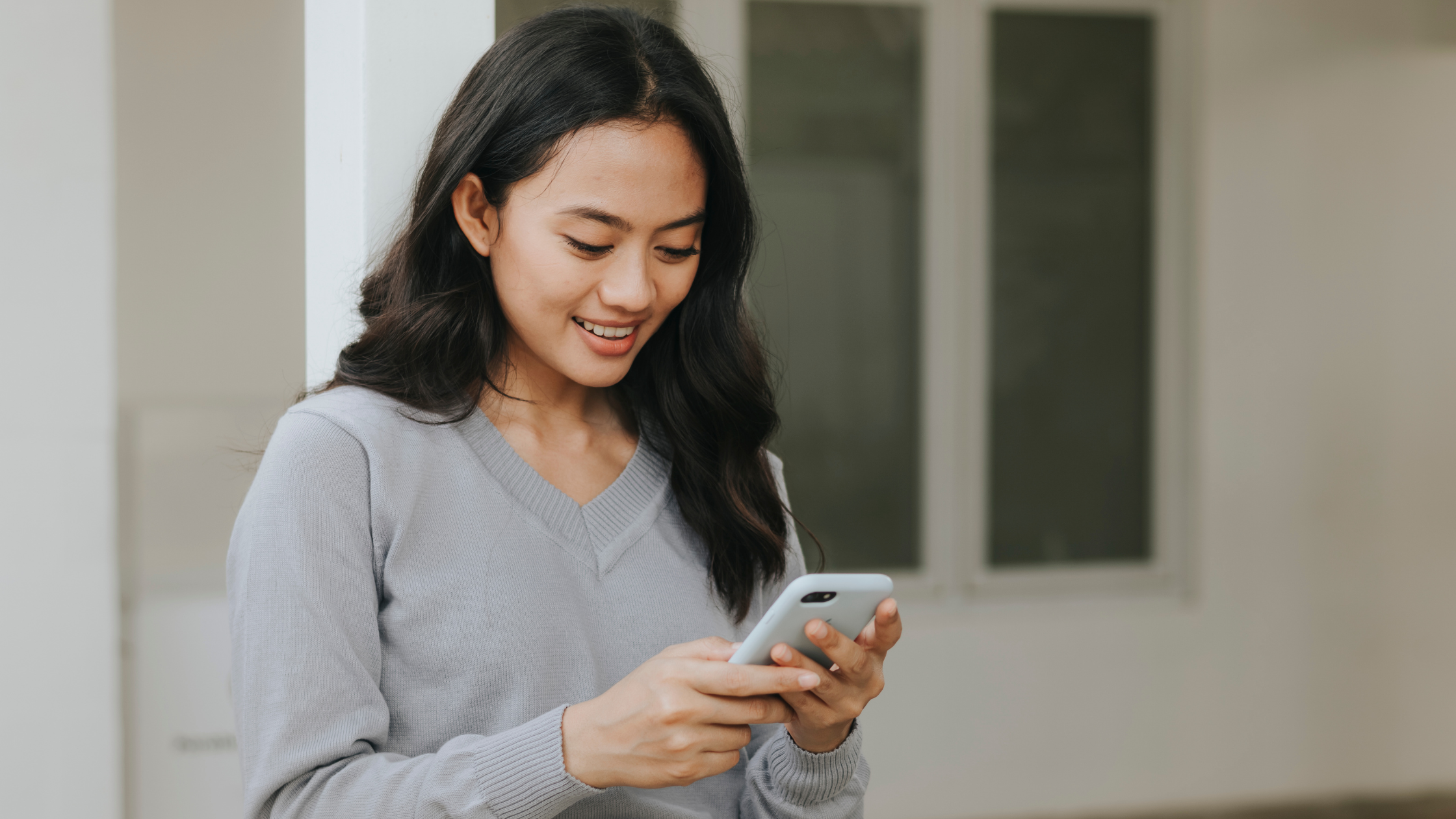 A person looking at a phone